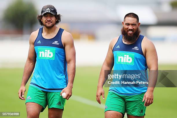 Steven Luatua and Charlie Faumuina of the Blues look on during a Blues super rugby training session at Alexander Park on February 2, 2016 in...