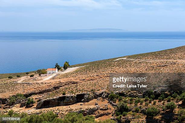 The southern coast of the Greek island of Crete near the town of Hora Sfakion, with the island of Gavdos, the southernmost point of Europe, in the...