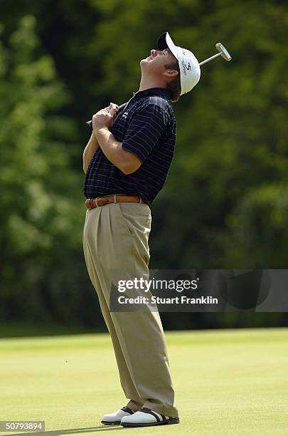 Graeme McDowell of Northern Ireland reacts to his putt on the sixth hole during final round at The Telecom Italian Open at Castello di Tolcinasco...