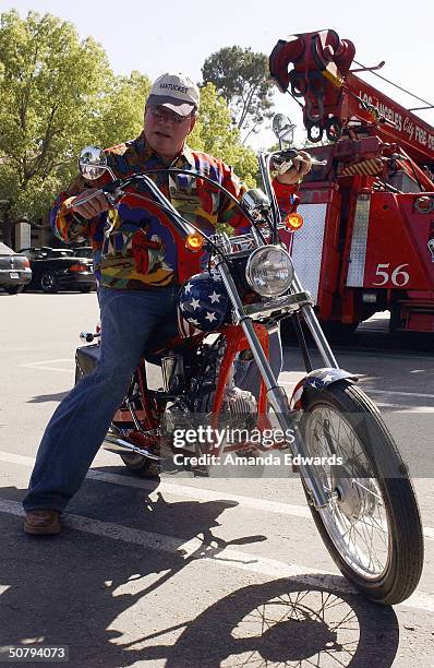 Actor William Shatner poses on a motorcycle at the 14th Annual Hollywood Charity Horse Show on May 1, 2004 at the Los Angeles Equestrian Center in...