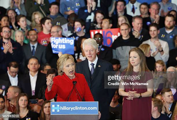 Democratic presidential candidate former Secretary of State Hillary Clinton speaks to supporters as Former U.S. President Bill Clinton and daughter...