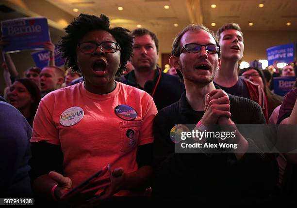 Supporters cheer as they wait for results during Democratic presidential candidate Sen. Bernie Sanders' caucus night party February 1, 2016 in Des...