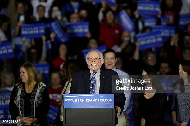 Democratic presidential candidate Bernie Sanders laughs as he speaks during his Caucus night event at the at the Holiday Inn February 1, 2016 in Des...