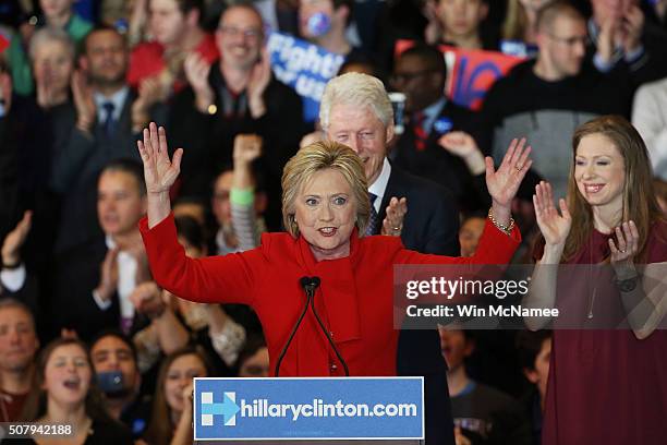 Democratic presidential candidate former Secretary of State Hillary Clinton speaks to supporters as Former U.S. President Bill Clinton and daughter...