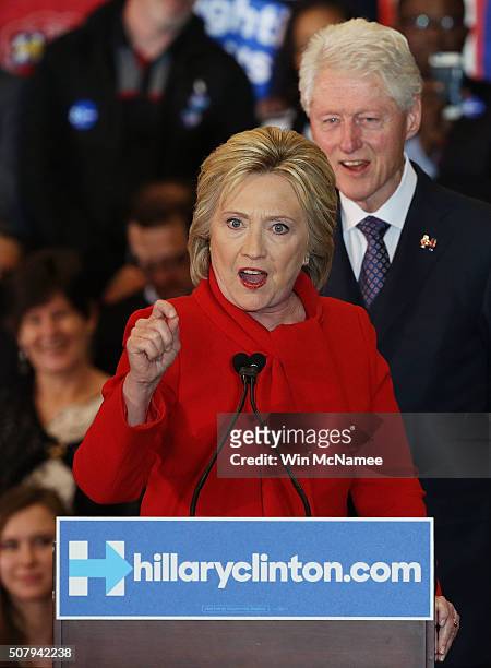 Democratic presidential candidate former Secretary of State Hillary Clinton speaks to supporters as Former U.S. President Bill Clinton looks on...