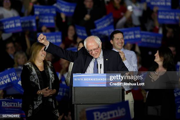 Democratic presidential candidate Bernie Sanders reacts as he speaks at the Holiday Inn February 1, 2016 in Des Moines, Iowa. Sanders was locked in a...