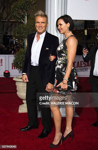 Actor Dolph Lundgren and Jenny Sandersson arrive at The Universal Premiere of Hail, Caesar! at the Regency Village Theatre, in Westwood, California,...