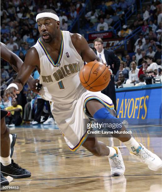 Baron Davis of the New Orleans Hornets drives against the Miami Heat in Game six of the Eastern Conference Quarterfinals during the 2004 NBA Playoffs...