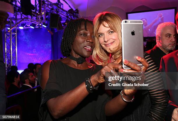 Auma Obama and Nastassja Kinski shoot a selfie during the Lambertz Monday Night 2016 at Alter Wartesaal on February 1, 2016 in Cologne, Germany.