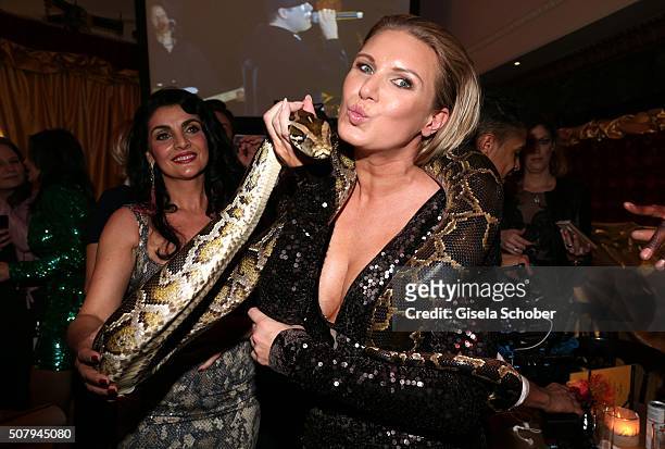 Magdalena Brzeska with a snake during the Lambertz Monday Night 2016 at Alter Wartesaal on February 1, 2016 in Cologne, Germany.