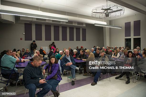 Caucus attendees wait as votes are tallied for their precinct at a Republican Party Caucus at Keokuk High School on February 1, 2016 in Keokuk, Iowa....