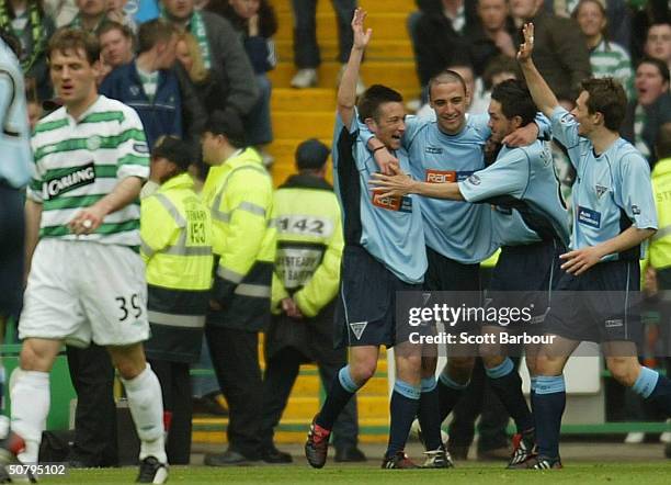 Dunfermline players celebrate after Gary Dempsey scored the winning goal during the Scottish Premier League match between Glasgow Celtic and...