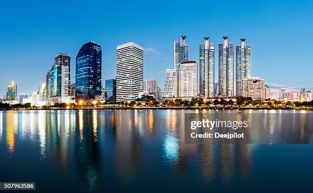 bangkok city skyline at benjakiti park at twilight, thailand - bangkok skyline stock pictures, royalty-free photos & images