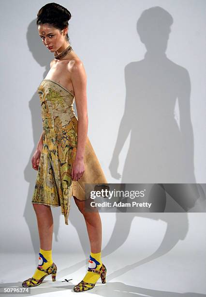 Model walks down the runway during the Akira Collection Show at Mercedes Australian Fashion Week Launch at Sydney University May 3, 2004 in Sydney...