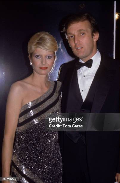 American businessman Donald Trump and his wife Ivana pose at a formal event, November 6, 1982.