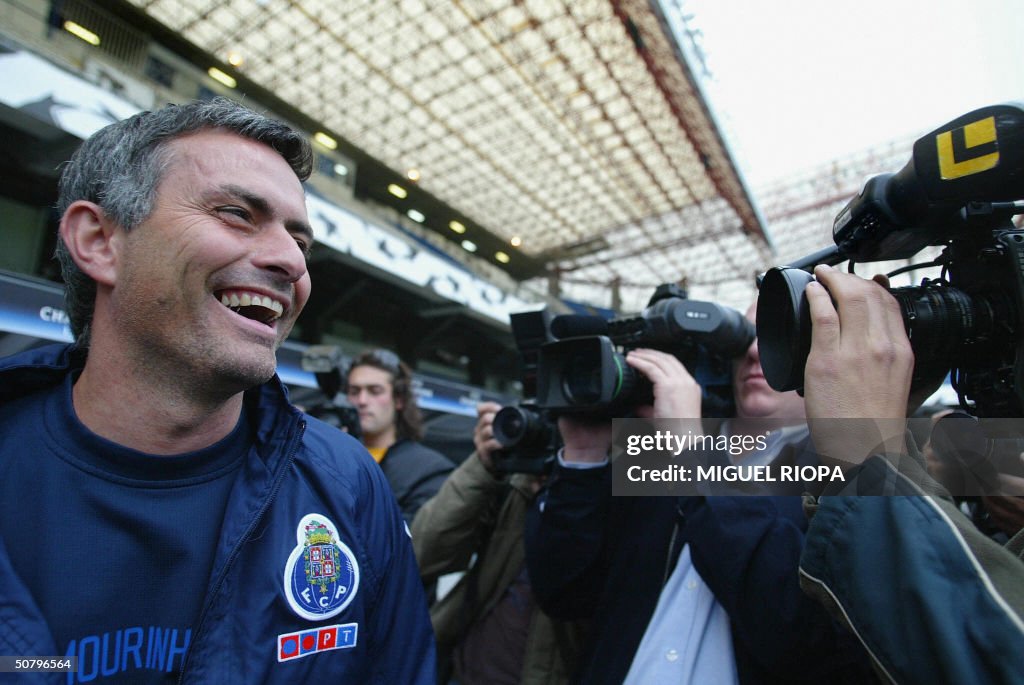 FC Porto's coach Jose Mourinho smiles at