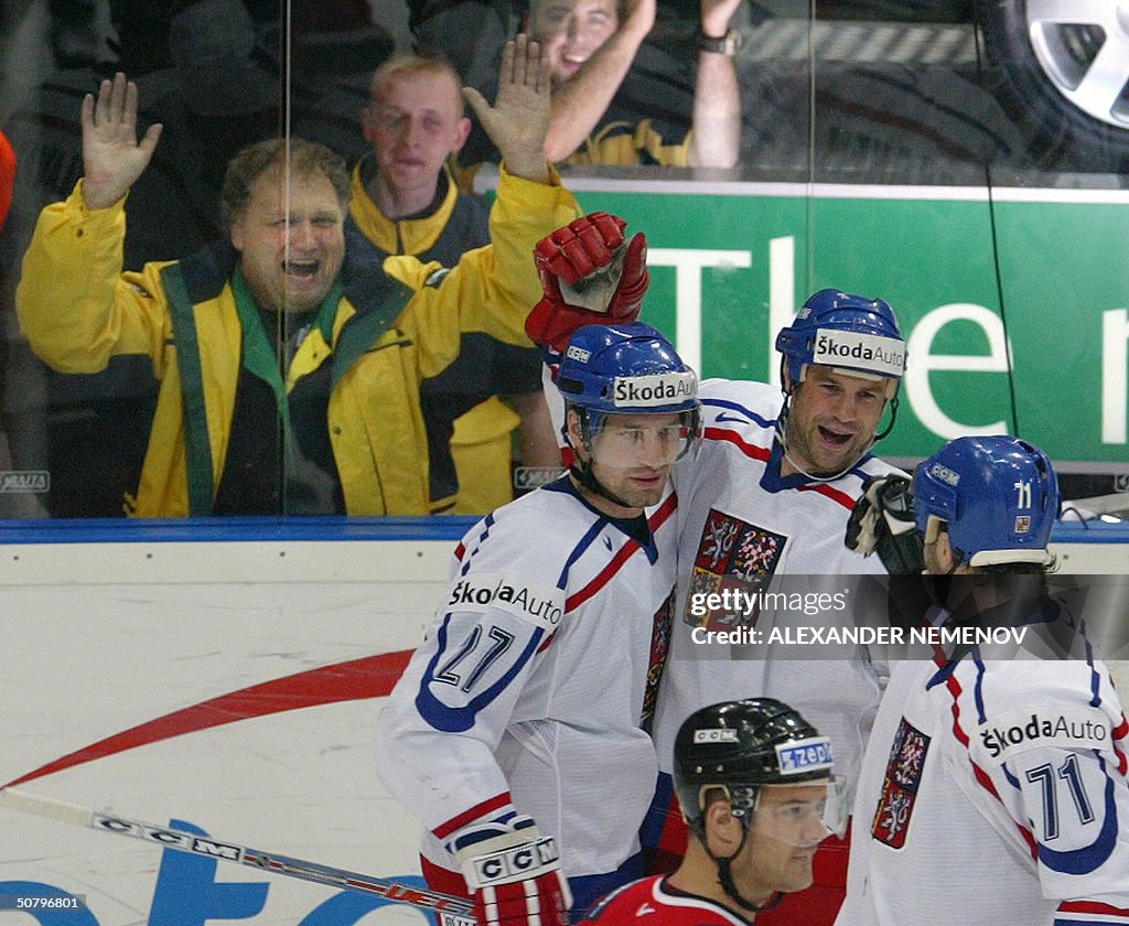 Czech players and arena staffers celebra