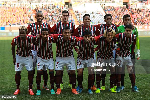 Mohun Bagan players line up prior to the 2016 AFC Champions League qualifying match between Shandong Luneng and Mohun Bagan at Jinan Olympic Sports...