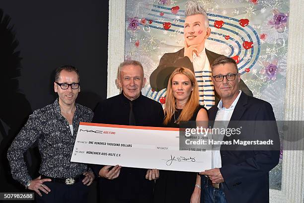 Direetor of the Kunsthalle Roger Diederen, Jean Paul Gaultier, Janina Hell and Michael Tappe during Jean Paul Gaultier Hands Over Check To Munich...