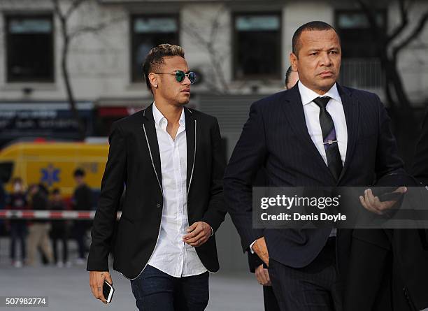 Neymar of FC Barcelona arrives at the National Court accompanied with his father Neymar da Silva Santos on February 2, 2016 in Madrid, Spain. Neymar...