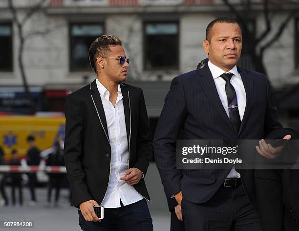 Neymar of FC Barcelona arrives at the National Court accompanied with his father Neymar da Silva Santos on February 2, 2016 in Madrid, Spain. Neymar...