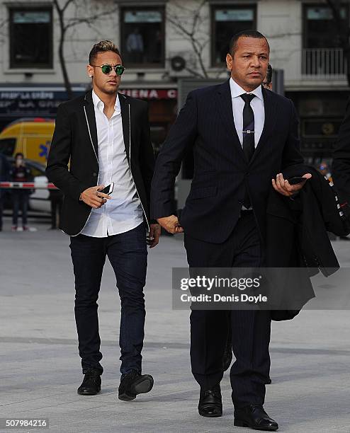 Neymar of FC Barcelona arrives at the National Court accompanied with his father Neymar da Silva Santos on February 2, 2016 in Madrid, Spain. Neymar...