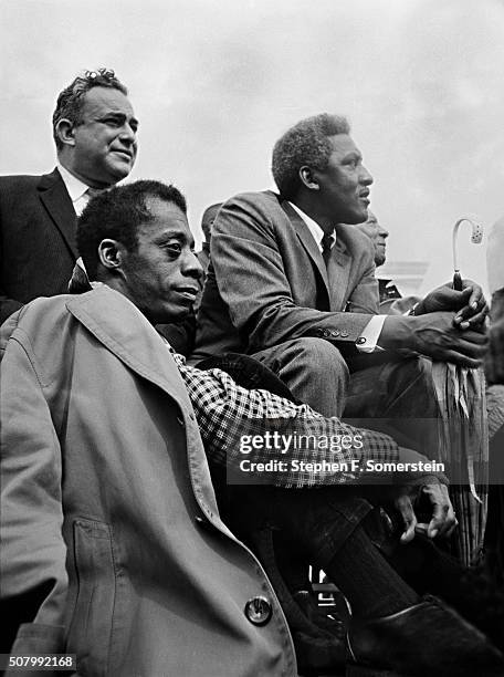 Author James Baldwin civil rights leader and march planner Bayard Rustin and A. Philip Randolph, president of Brotherhood of Sleeping Car Porters...