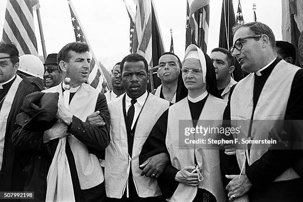 At the head of the march, nuns, priests and civil rights leaders leave from the City of St. Jude school grounds on March 25, 1965 in Montgomery,...
