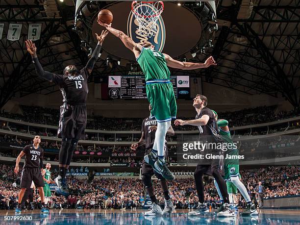 JaVale McGee of the Dallas Mavericks grabs a rebound against the Minnesota Timberwolves on January 20, 2016 at the American Airlines Center in...