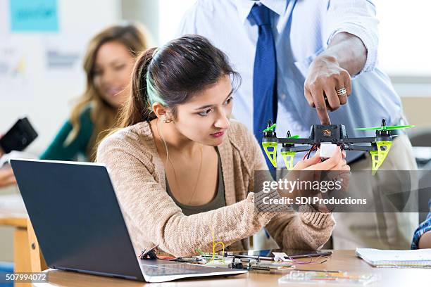 stem high school student works on drone in class - college for creative studies stock pictures, royalty-free photos & images