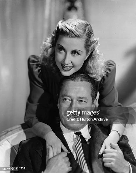 Genevieve Tobin and Edmund Lowe star in 'Our Neighbors the Carters', directed by Ralph Murphy for Paramount.