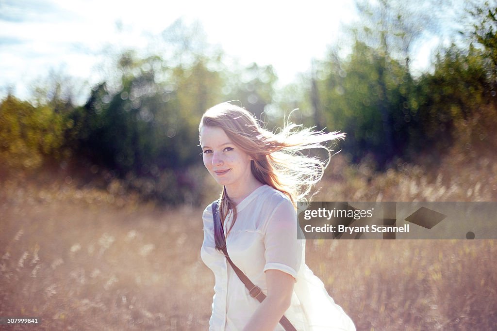 Portrait of woman with hair blowing