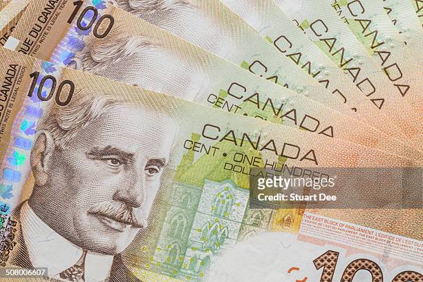 canadian 100 dollar bills - canadian one hundred dollar bill 個照片及圖片檔
