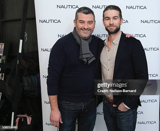 Steve Mcsween, Vice President Global Design Men's Nautica and actor Chace Crawford pose backstage at the Nautica Men's Fall 2016 fashion show during...