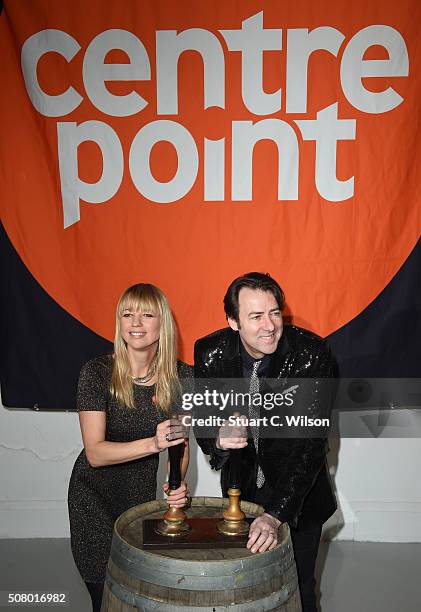 Jonathan Ross and Sara Cox arrive for Centrepoint's annual Ultimate Pub Quiz on February 2, 2016 in London, England.