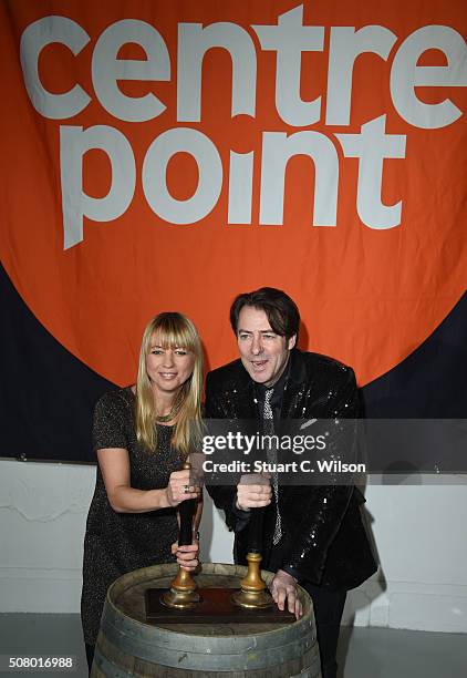 Jonathan Ross and Sara Cox arrive for Centrepoint's annual Ultimate Pub Quiz on February 2, 2016 in London, England.