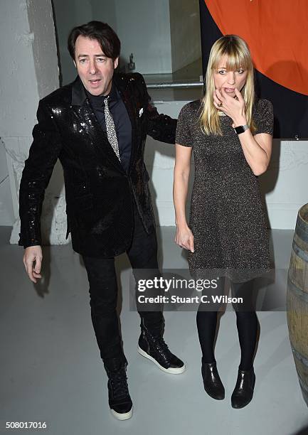 Jonathan Ross and Sara Cox arrive for Centrepoint's annual Ultimate Pub Quiz on February 2, 2016 in London, England.