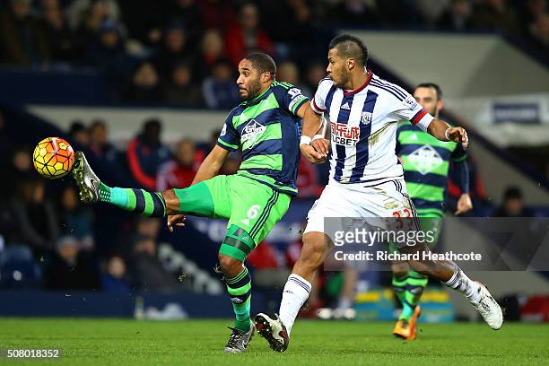 Ashley Williams of Swansea City and Salomon Rondon of West Bromwich Albion compete for the ball during the Barclays Premier League match between West...