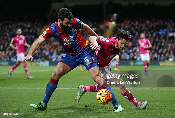 Mile Jedinak of Crystal Palace and Harry Arter of Bournemouth compete for the ball during the Barclays Premier League match between Crystal Palace...