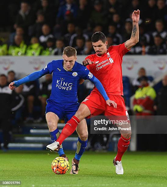 Dejan Lovren and Mamadou Sakho of Liverpool take on Jamie Vardy of Leicester City during the Barclays Premier League match between Leicester City and...