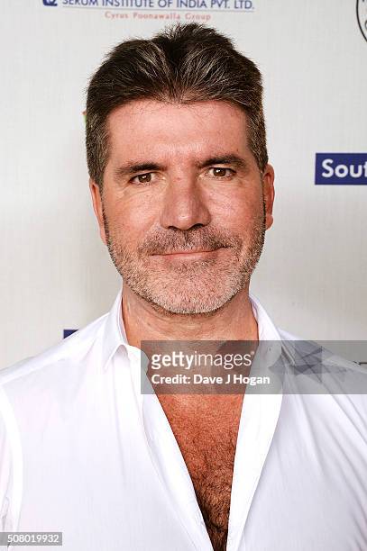 Simon Cowell attends a reception and dinner for supporters of The British Asian Trust at Natural History Museum on February 2, 2016 in London,...