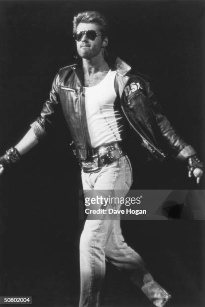 British singer-songwriter George Michael performing on stage, 1988.