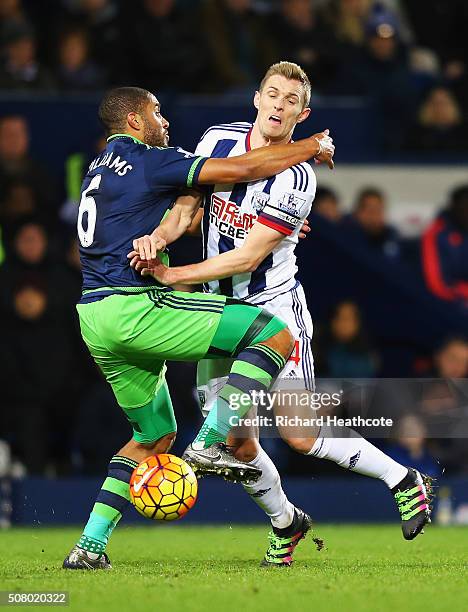 Darren Fletcher of West Bromwich Albion is challenged by Ashley Williams of Swansea City during the Barclays Premier League match between West...