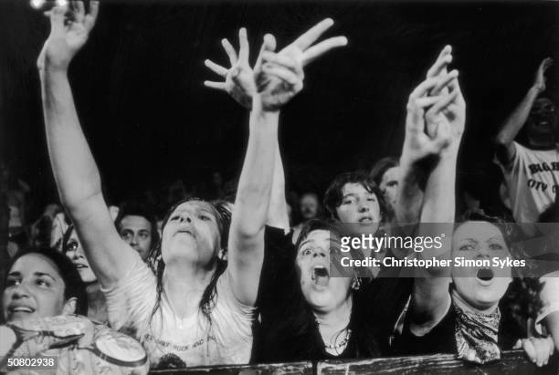 Rolling Stones fans get excited during a concert on the group's 1975 Tour of the Americas.