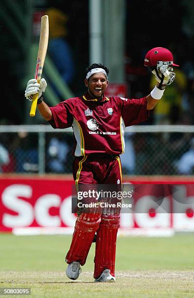 Ramnaresh Sarwan celebrates his century during the 7th One Day International at the Kensington Oval, on May 5 in Bridgetown, Barbados.