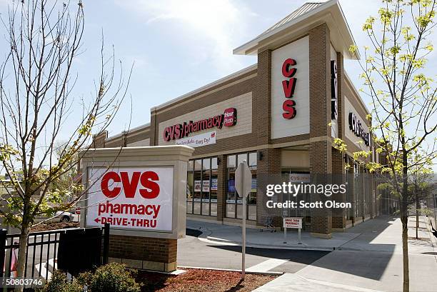 Sign marks the location of a newly-opened CVS pharmacy May 5, 2004 in Chicago, Illinois. CVS posted nearly a 25 percent rise in first quarter profit...