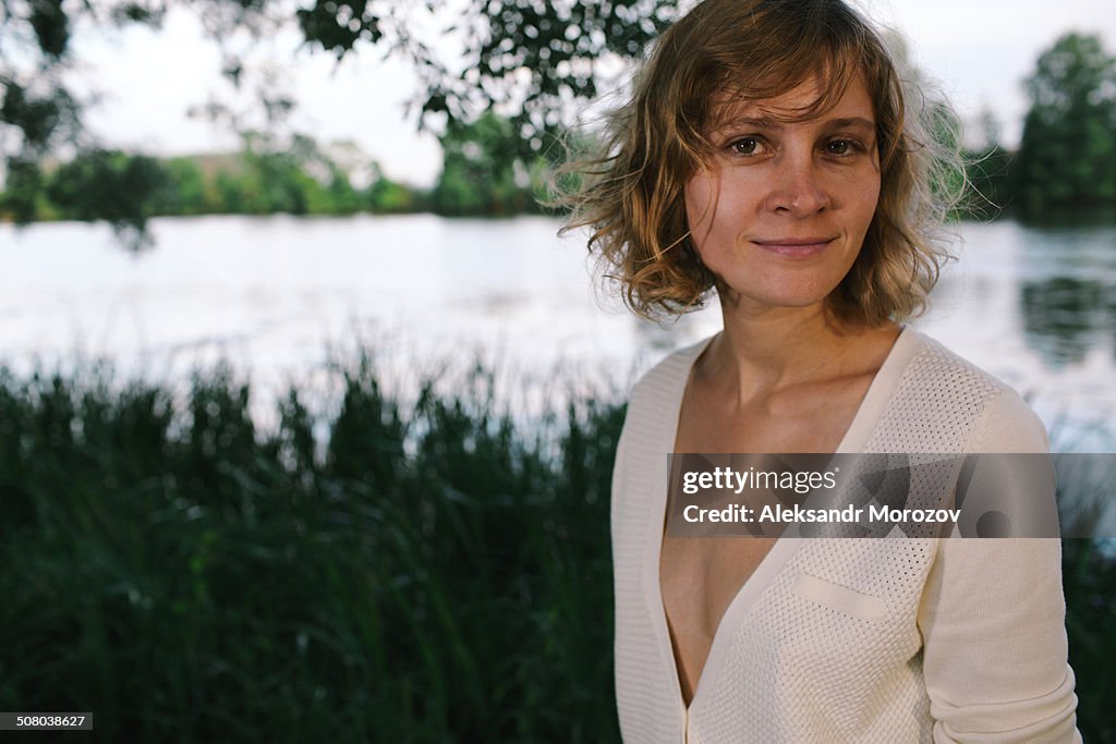 Young woman on the lake