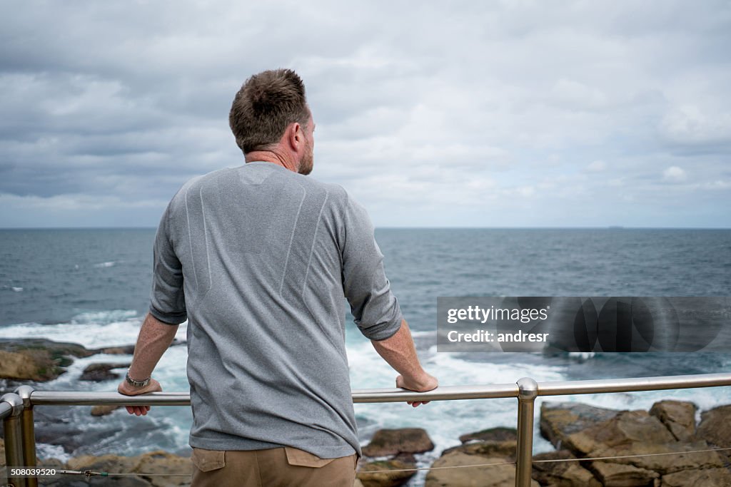 Thoughtful man at the beach