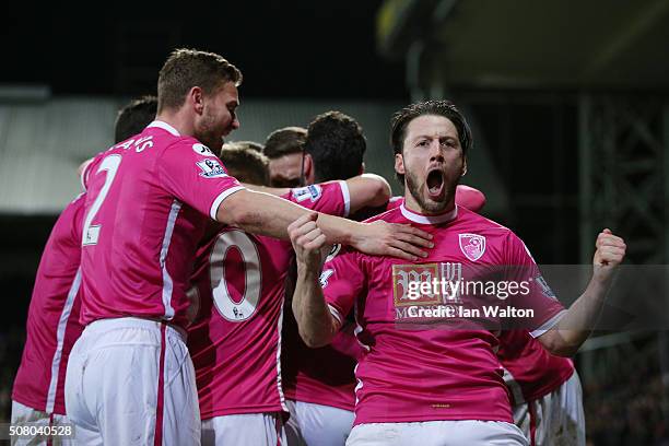 Harry Arter of Bournemouth celebrates his team's second goal by Benik Afobe celebrates scoring his team's second goal during the Barclays Premier...