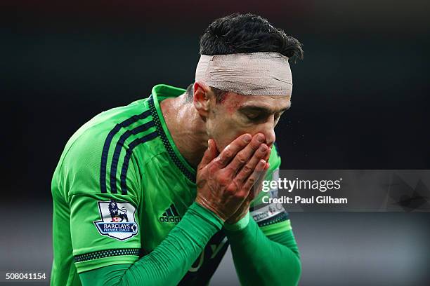 Jose Fonte of Southampton wearing bandage is seen during the Barclays Premier League match between Arsenal and Southampton at the Emirates Stadium on...